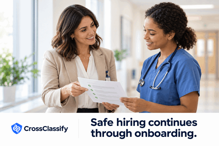 Healthcare recruiter handing a documented onboarding and supervision plan to the clinical manager receiving a new colleague.